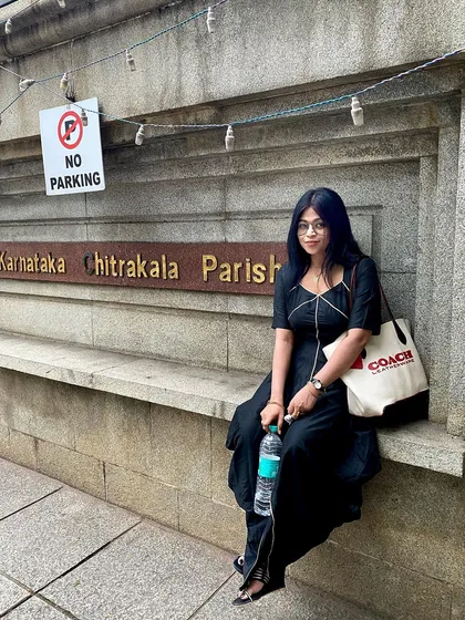 Taking a moment outside the Karnataka Chitrakala Parishath during the exhibition. These events are filled with great energy and inspiration.