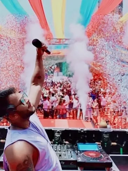 Capturing the pure chaos and color of a Holi festival. With confetti cannons firing and a sea of people dancing, I know how to command the stage and create a massive party atmosphere for any festive occasion.