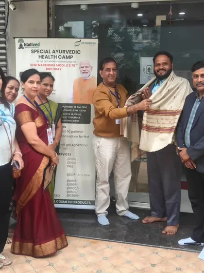 Another view of the felicitation ceremony at the Special Ayurvedic Health Camp, held to serve the community and promote natural healing.