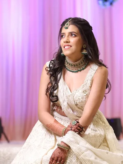 Natural glam for a graceful bride. This look is all about enhancing her features with a light touch, creating a fresh and dewy finish.
