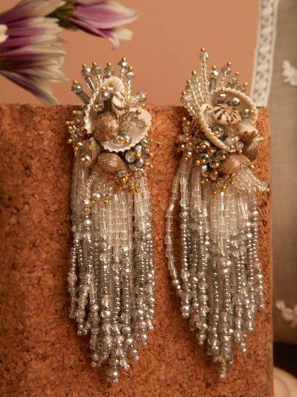 These shell and crystal tassel earrings were a huge hit, perfect for a beach wedding or a bohemian look.