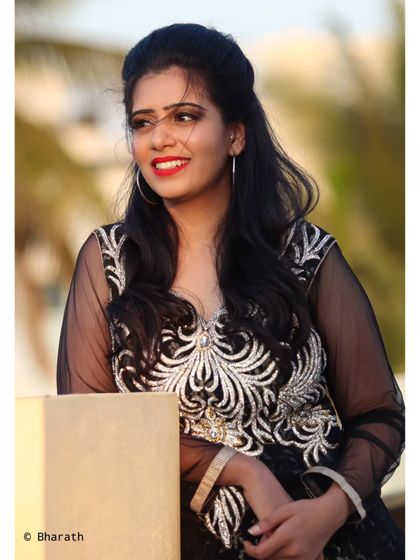 A smiling portrait that perfectly captures the joy of a beautiful evening. The golden hour light adds a magical touch.