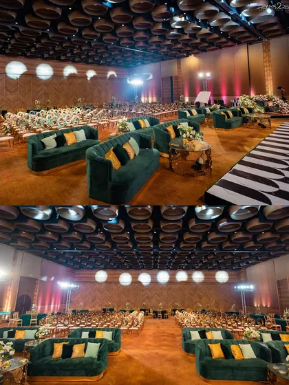 The Sangeet seating was a mix of plush emerald green sofas for a relaxed lounge feel and formal round tables. This layout ensured guest comfort while maintaining a sophisticated and glamorous look.