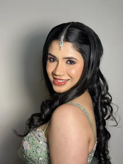 A beautiful, glowing portrait of this bride, her makeup looking fresh and radiant.
