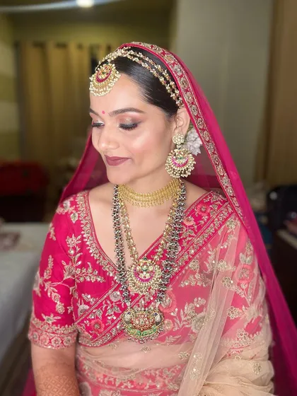 A close-up of my signature bridal makeup. This look features soft, blended eyeshadow, glowing skin, and a defined lip, creating a timeless and photogenic result that enhances the bride's features beautifully.