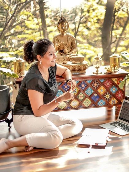 Technology allows us to connect with and guide clients all over the world. Here I am, working on personalized client plans from my space, surrounded by the calming presence of nature.