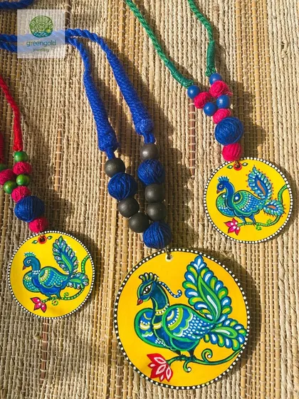 One of my favourite custom orders. I painted this matching set of three peacock pendants for a mother and her two young daughters. Creating pieces that connect families and tell their stories is the greatest joy of my work.