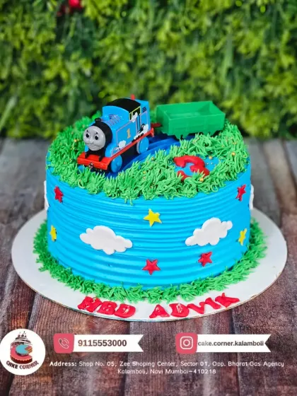 All aboard! A cute Thomas the Tank Engine cake for Advy's birthday. The bright blue train on a grassy field is a classic choice for toddlers.