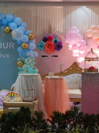 A beautiful unicorn theme for a 'Four Ever' birthday party, combining a sequin wall, pastel balloons, and a custom throne for the birthday girl.