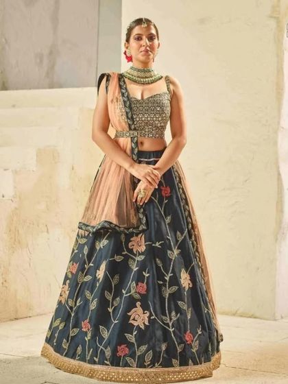 Another angle of our navy blue and peach lehenga, showing how beautifully the colors work together. It's a sophisticated choice for an engagement or reception.