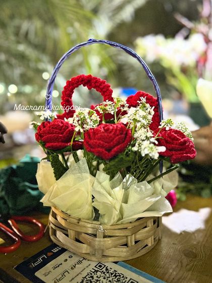Another view of our crochet rose basket, captured in our workshop. Each petal is crafted by hand to create a beautiful, everlasting floral gift.