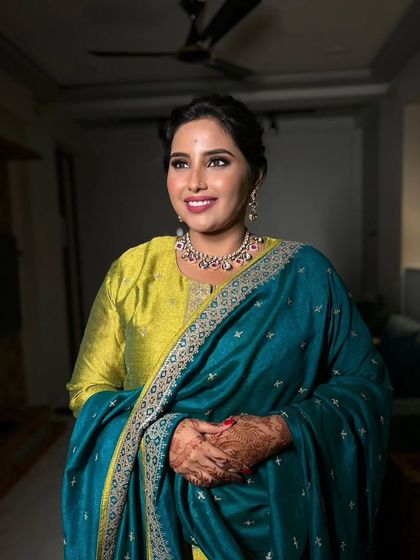 A happy and confident portrait. This look is perfect for a family member or a bride who prefers a more understated yet polished style.