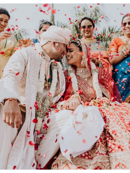 The moment it becomes real. Surrounded by loved ones and a shower of petals, their joy was so bright and infectious. This is the beautiful chaos I love to capture.