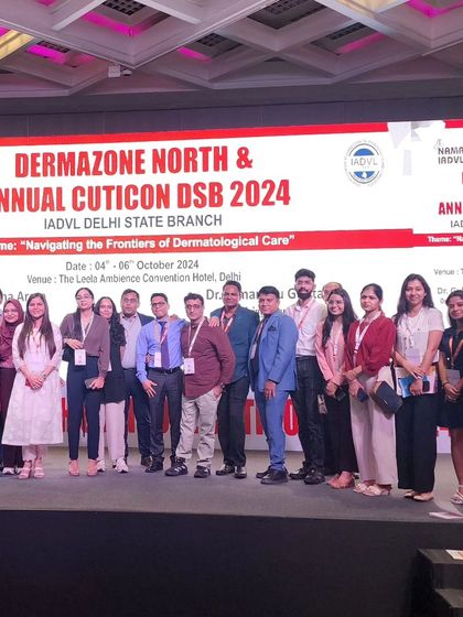 The full team of organizers and faculty at DERMAZONE NORTH.