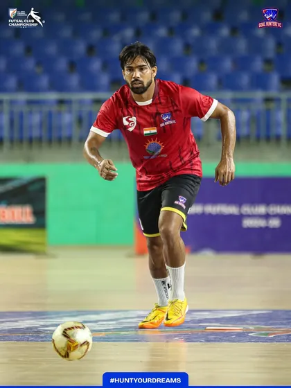 A player getting in some running during the warm-up to prepare for the fast-paced game.