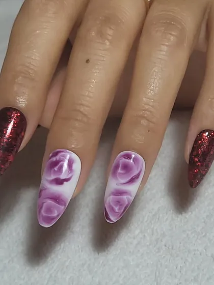 A beautiful combination of sparkling red glitter and blooming gel roses in purple. A custom design for a client who wanted something bold and romantic.