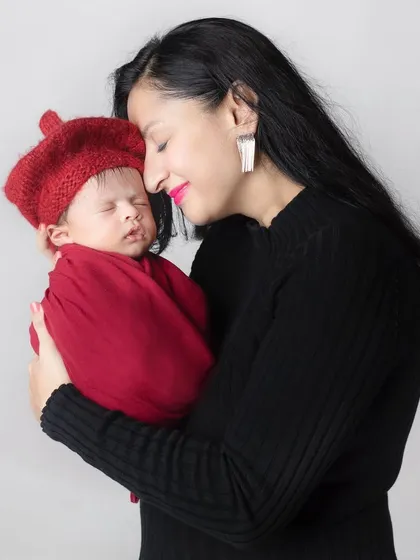The purest love you will ever know. A mother's gentle touch with her newborn.