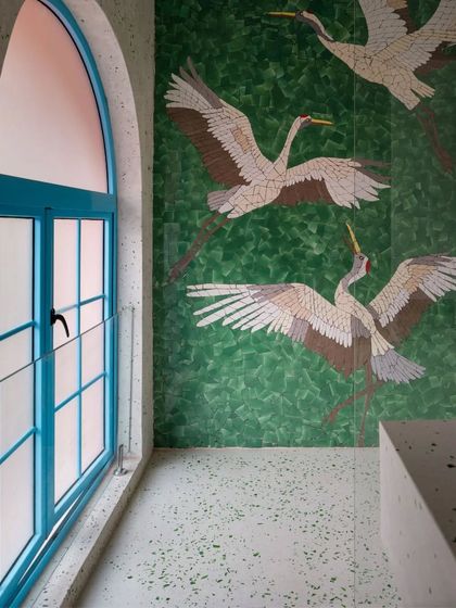 This bathroom features a stunning custom mosaic wall depicting cranes in flight. It is an example of how I integrate art directly into the architecture, turning a functional wall into a captivating focal point.