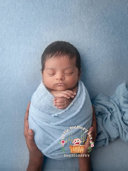 This pose, with the baby held securely in parents' hands, is a powerful way to show just how small and precious your newborn is. It's a favorite for many families.
