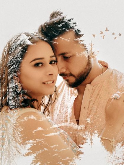 A creative double exposure portrait that blends an intimate close-up with the silhouette of pine trees. This artistic approach adds a layer of depth and nature to their Jaipur love story.
