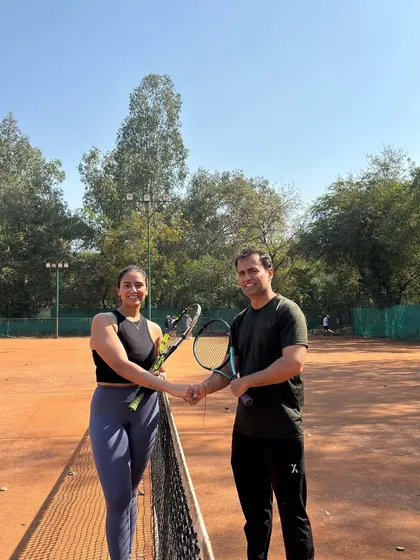 Sportsmanship is at the heart of our community. A friendly handshake at the net after a competitive match during our Amateur Tournament.