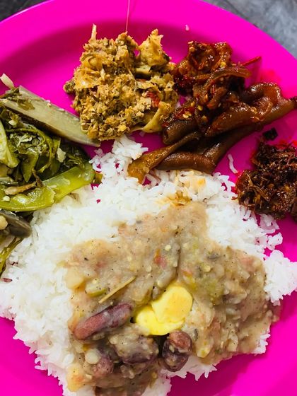 I really enjoyed my lunch today. It included a mixed bean and potato stew, boiled greens, scrambled eggs with Axone, and some pickles.