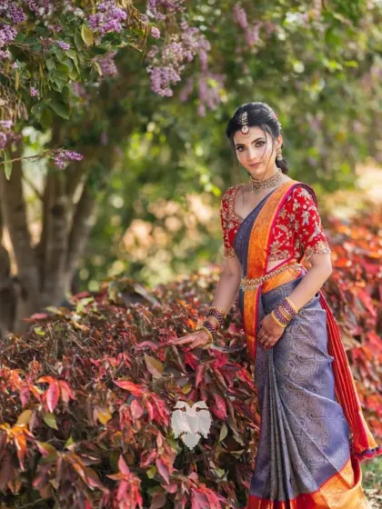 Tradition comes alive in this stunning look. I designed this rich, red velvet blouse for Jahnavi's pre wedding celebrations. The gold zardosi work, highlighted with sequins, creates a flowing creeper pattern that is both radiant and full of character.