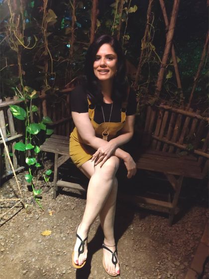A casual look for exploring Goa. I wore this mustard pinafore dress over a simple black t-shirt with flat sandals, a practical and cute outfit for a day out.