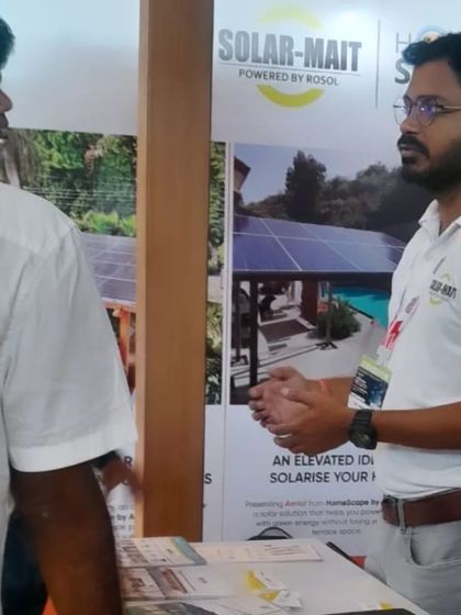 A member of our team explains the benefits of our residential solar solutions to a visitor at an expo. We believe in educating consumers to help them make the best choice for their energy needs.