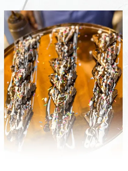 A platter of our delicious chocolate waffles, ready to be served. Our live waffle stations are a huge hit at parties and corporate events.