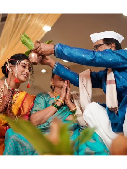 The parents bless the bride during the pre-wedding rituals, a moment full of emotion and tradition.