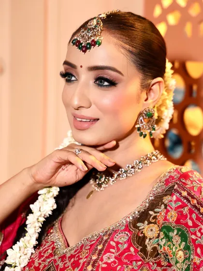 A happy smile from my beautiful bride. Her flawless makeup and traditional jewelry make for a timeless wedding day look.