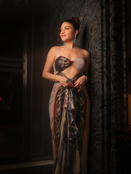 A slightly different angle of the full look, showing how the makeup and outfit create a stunning and cohesive statement.