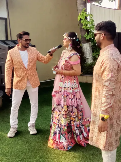 Interacting with the bride during her Mehendi ceremony. I love creating personalized moments that celebrate the couple throughout their wedding events.