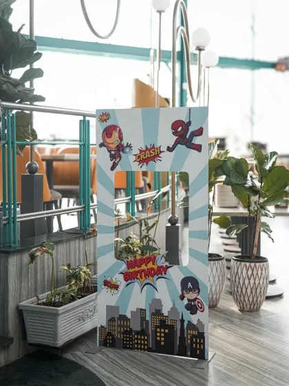 A fun, interactive photo frame for a superhero party. Kids can pose as their favorite heroes like Iron Man and Spider-Man.