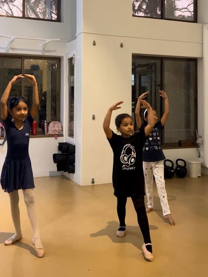 Young dancers learning a new combination. The look of concentration on their faces is priceless.