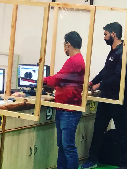 A coach provides hands-on instruction while maintaining safety protocols. We ensure every shooter receives personalized attention to refine their technique.