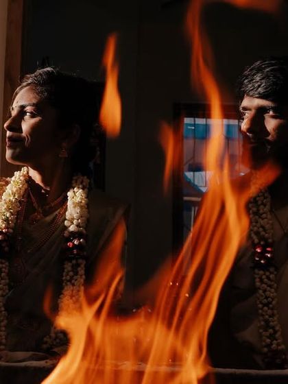 A duplicate of 129, a powerful and artistic shot of the couple at the wedding homam.