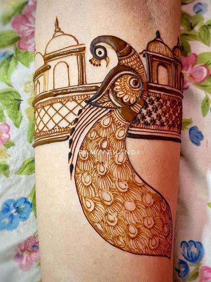 Another angle of the peacock and palace arm band, showing the clean lines and balanced composition of the design.