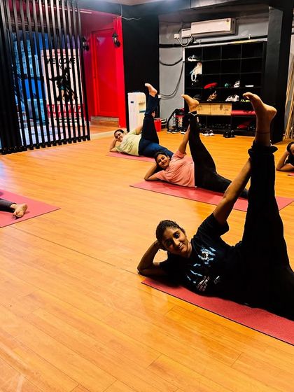 Working on hamstring and hip flexibility with a lying leg stretch. Improving flexibility is crucial for preventing injuries and enhancing overall movement.