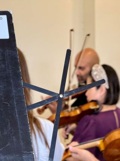 An intimate shot from the rehearsal, capturing the collaboration and communication between the musicians of the Verbier Festival Chamber Orchestra.