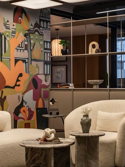 Another angle of the office mural, highlighting its integration with the shelving and seating area. The composition flows across the wall, engaging with every element of the interior design.