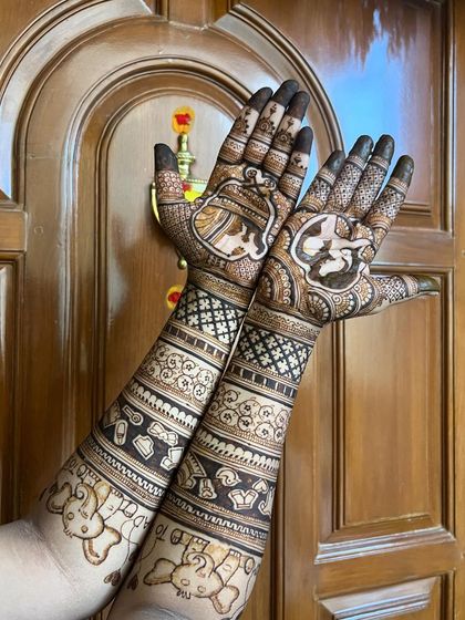 This design is filled with cute motifs for a baby shower, including a baby sleeping on the moon and a stork carrying a baby. The forearms are adorned with teddy bears and baby items.