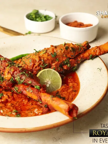 Taste the royalty in every bite. These tender mutton shanks are slow cooked in a rich, spicy gravy, falling right off the bone.