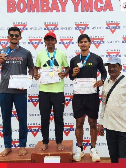 More of our talented male athletes on the podium, celebrating their achievements in track and field.