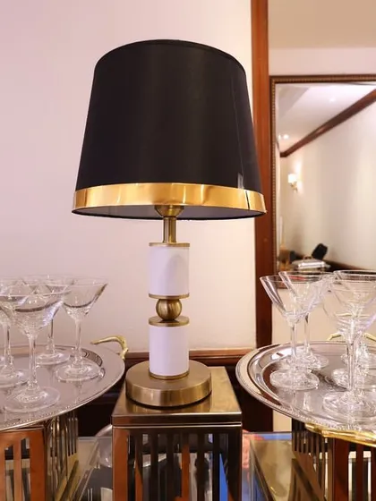 Martini glasses ready for serving gourmet appetizers or desserts. We use elegant glassware to elevate the presentation of our food and drinks, adding a touch of class to the event.