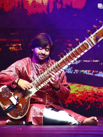 Performing on stage during my USA tour in Dallas. I have had the privilege of taking my music to international audiences, performing in concerts and musicals across the United States and Dubai.