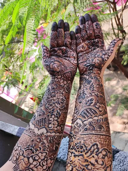 This shot, taken outdoors, shows how the natural light highlights the rich color of the organic henna paste I use.