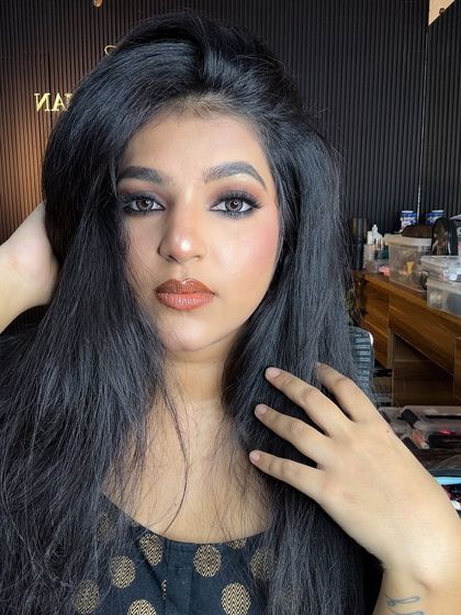 A confident portrait of me wearing the classic smokey eye look.