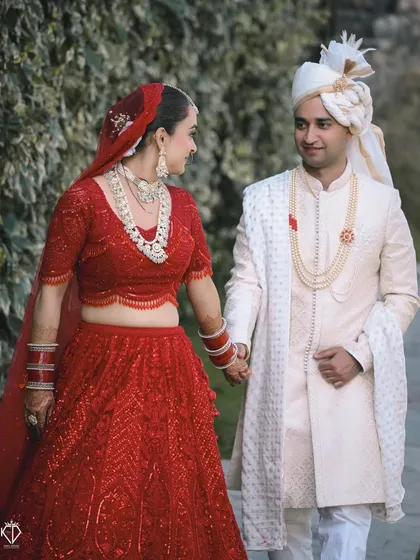 A candid moment during their wedding day walk, the couple sharing a look of love and happiness.